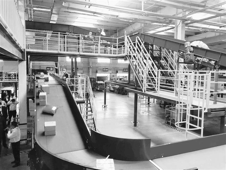 甘肅郵政智能化郵件處理中心在蘭州新區(qū)投產(chǎn) 日均處理可達(dá)60萬(wàn)袋（件）