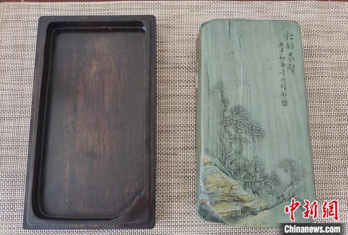 圖為盧保勝為提升洮硯文化內(nèi)涵，制作“一硯一銘、一盒一拓”成品展示?！堟?攝