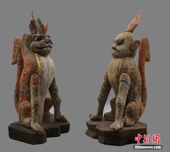 圖為慕容智墓出土鎮(zhèn)墓獸。 中新社發(fā) 甘肅省文物局 供圖